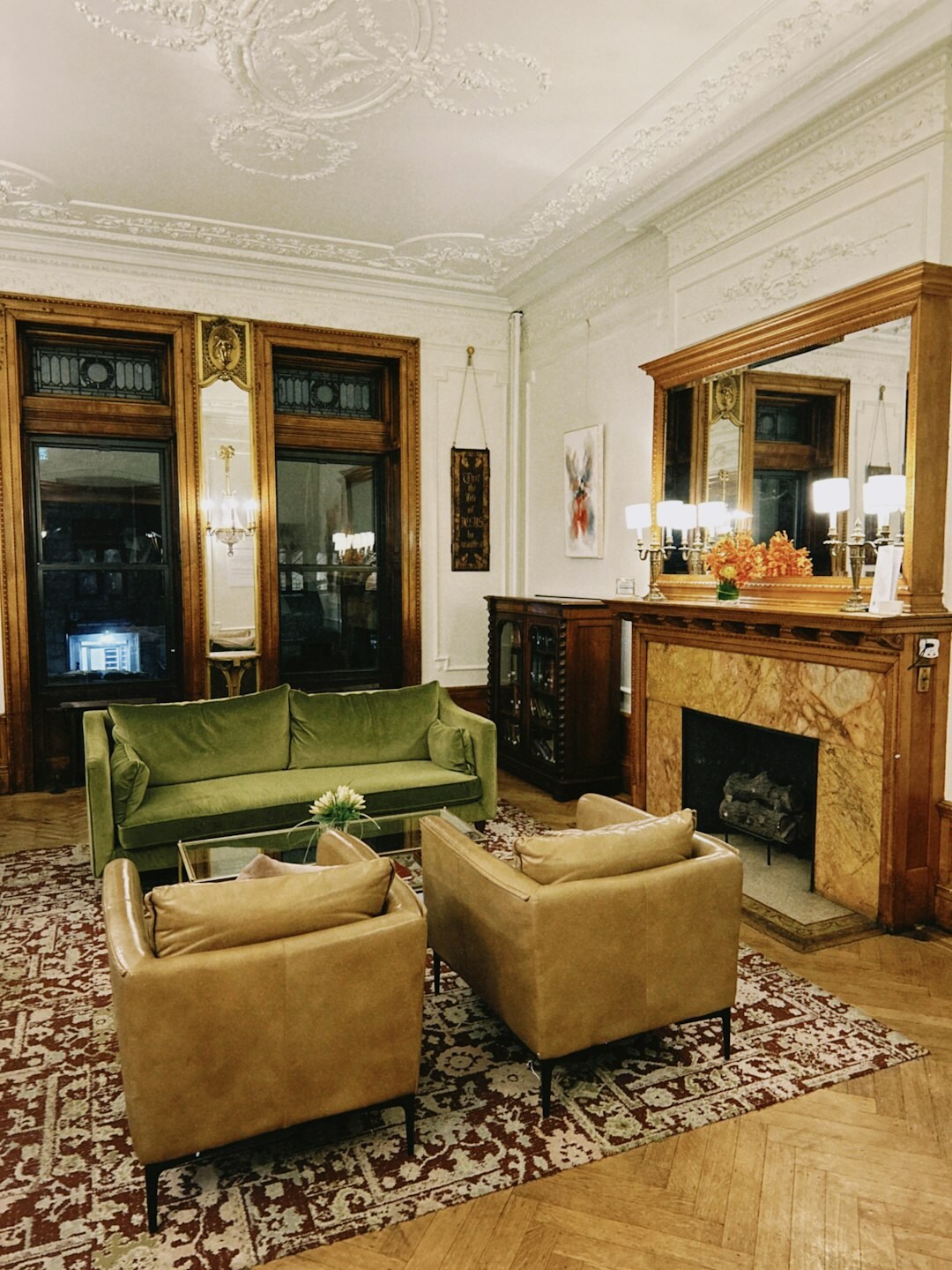 Elegant vintage-style luxury living room with velvet sofas and warm lighting